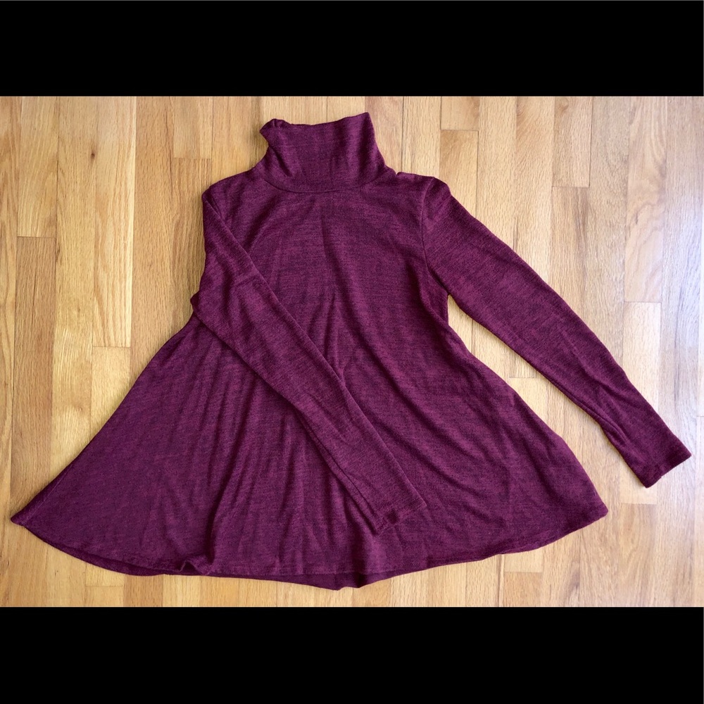 Urban Outfitters Turtle neck babydoll sweater.